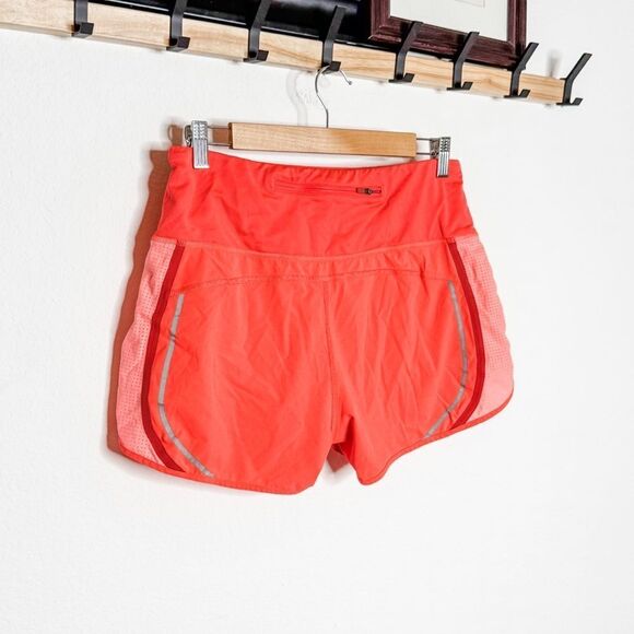 Athleta Bright Orange Running Shorts w/Back Zip Pocket & Reflective Trim Size M - Picture 4 of 9